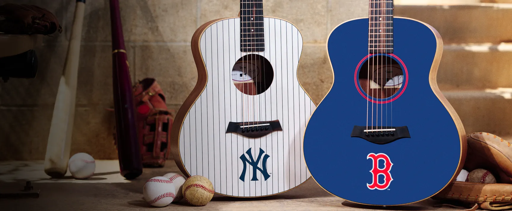 image showing a NY Yankee's Guitar and a Boston Red Sox guitar